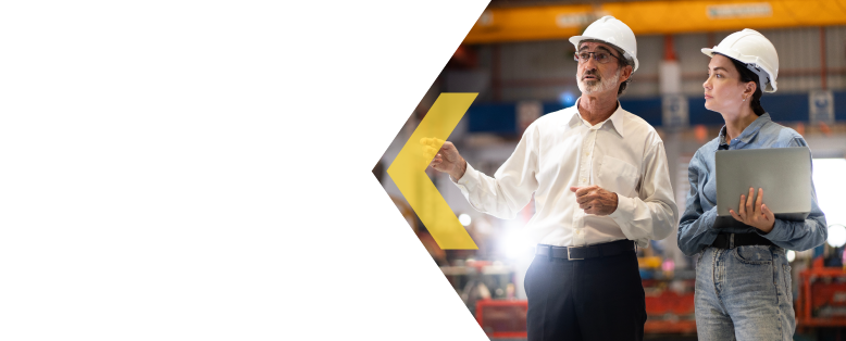 Businesspeople in hard hats discuss growing their manufacturing business with SAP S/4HANA Cloud Public Edition